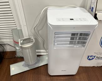 Portable air conditioning unit.....