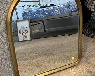 Gold framed wall mirror