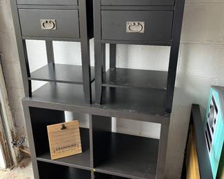 Black painted nightstands and cubbie unit
