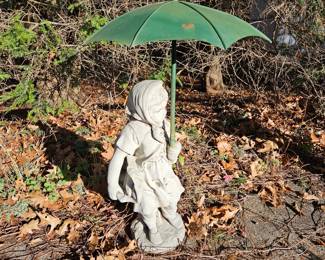 Girl with umbrella garden statue 