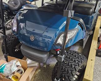 Great condition golf cart already has roof collapsed for easy removal or shipping.