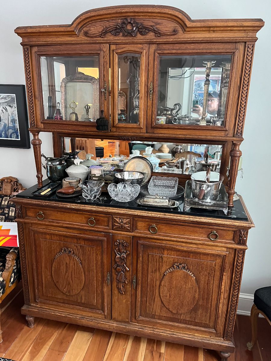 Antique hand-carved hutch/buffet with marble top.