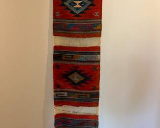 Southwest patterned wool runner/rug, displayed here as a wall hanging.