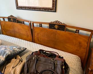 Vintage twin beds with ornate headboards. Include mattress and box spring.