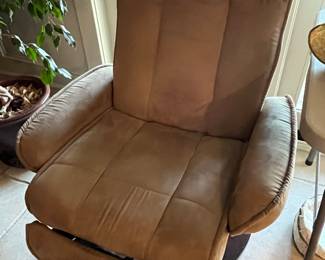 Upholstered swivel recliner by The Barcalounger Company.