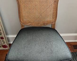 Closer look at one of the six chairs that accompany dining table.