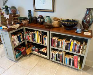 Bookshelves; hundreds of books and games throughout the house.