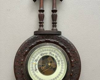 Antique carved walnut barometer.