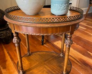 Vintage two-tier wood table; vase by Grand Rapids artist Scott Berman.