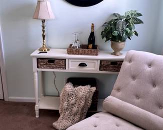 small console table, lamp, clock