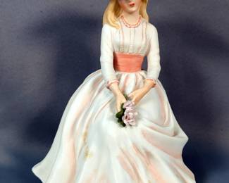 Enesco Porcelain Figurines Sitting Lady, Marked E 1410, 7.5" Tall And Standing Lady, Marked E 9009, 9.5" Tall