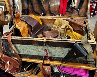 Bags, suspenders, holster, saddle bags….