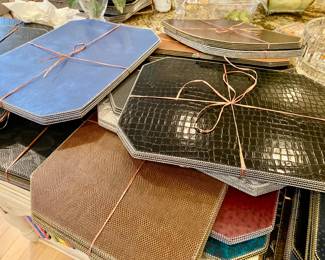SETS OF ASSORTED PLACEMATS, SOLD AT NEIMAN MARCUS, SAKS AND BLOOMINGDALES FOR $30-40 EACH PIECE