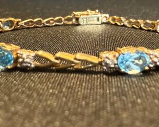 TN63 NAGL Certified 10k White Gold, Blue Topaz, 7 Bracelet See certificate for more information