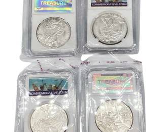 TN03 Silver Eagles In Holders Four US Mint one ounce Silver Eagles in plastic holders.
