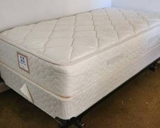 Sealy Posturpedic twin sized mattress and boxed springs with frame