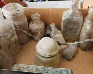 Antique bottles and glass insulator