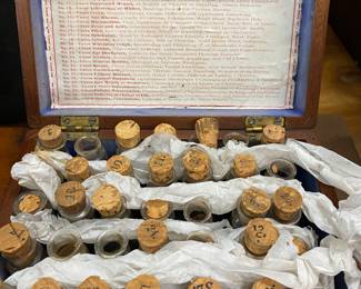 Box of vintage Humphrey’s remedies containers. Most do have the stoppers!