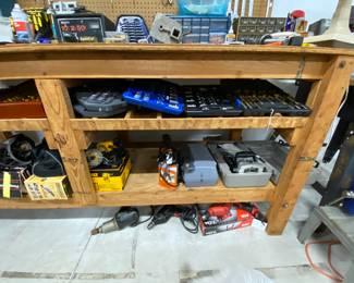 Various electric hand tools and socket sets