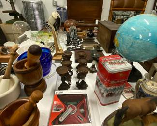 Jim beam horse decanter, a Budweiser tin, Eton weather alert am/fm radio and several Vaporizer and Cresolenes’.