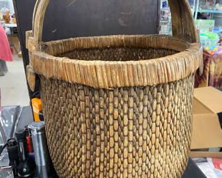 Large antique Chinese woven rice bucket with bent bamboo handle