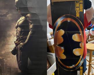 2 Batman posters among an array of other posters 