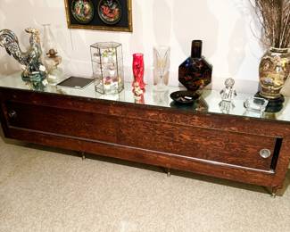 Had made in 1960 large console. Is wired for lamps on either end. MCM vases