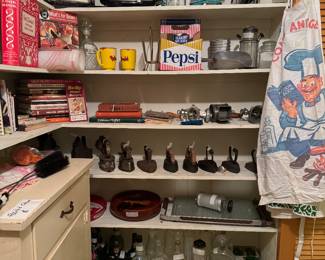 Vintage cookbooks, antique Irons, old liquor bottles, 