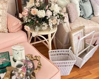 Gold trunk, trays, shabby chic pink chair and ottoman, white side table, kids books, pillows, wicker coat stand, Kate Spade handbag, Hollywood Regency decor