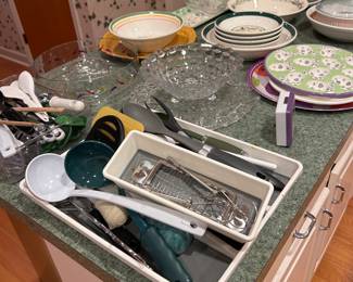 Kitchen plates, utensils, china sets, bowls, serving dishes, plastic containers, toaster over, new Cuisenart hand mixer, new coffee machine, and MORE!