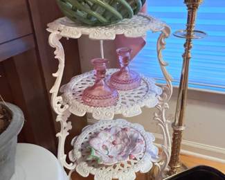Ornate white wrought iron table, brass, ceramic