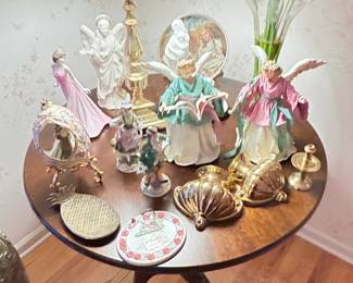 Collectibles, brass sconces, brass pineapple trinket tray