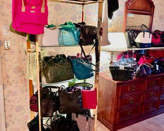 Huge bedroom filled with clothes, shoes, handbags, many are brand new with tags! Some brands include Vera Bradley, Coach, Kate Spade and more!