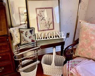 White wicker, April Cornell linens, throw pillows, silk embroidered artwork