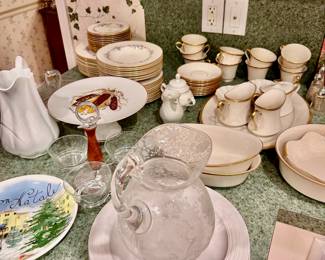 Kitchen plates, utensils, china sets, bowls, serving dishes, plastic containers, toaster over, new Cuisenart hand mixer, new coffee machine, and MORE!