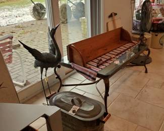 Glass top & metal coffee table, metal bird sculpture, Oak wall hanging shelf.