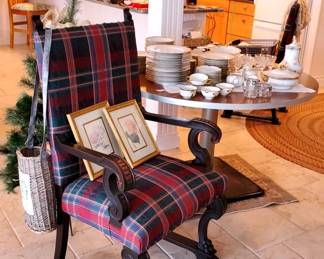 Antique Carved wood armchair with Lion paw feet and newer upholstery. Theres a matching side chair as well.