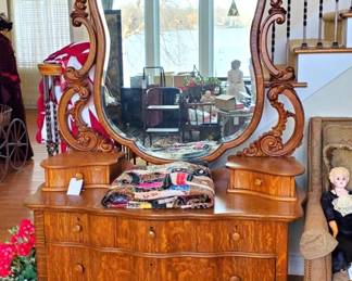 Incredible 19thc Large Oak serpentine dresser with beveled mirror.