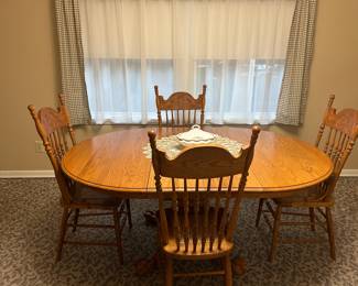 Oak dining table with 4 chairs