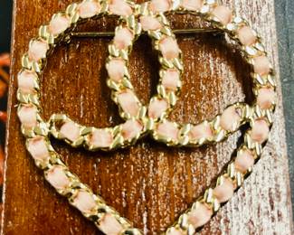 Classic Chanel pink woven cc heart.