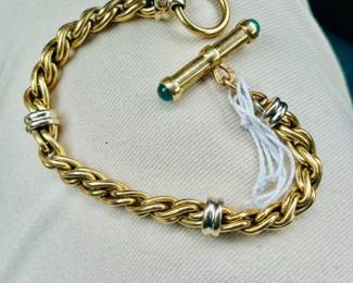 A twisted 14k bracelet with toggle clasp.
