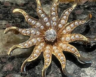 Antique 14k diamond see pearl sunburst pin/pendant.