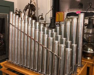 Metal Art Deco Era tubes from a marimba can be mounted as sculpture