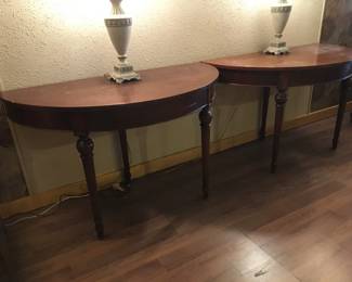 Pair of mahogany demilune that fit together to make a round table! Very handsome and handy!
