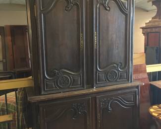 Fabulous French armoire. Beautiful carved flower basket motif. Imported from France!