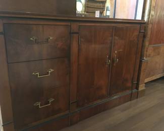 Drexel credenza with three drawer and two door cabinet with shelves. Very lovely brass hardware. Mahogany beauty!!!!