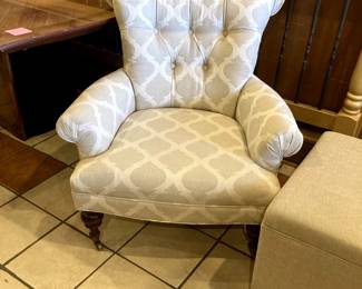 Upholstered traditional chair, casters on front legs, very clean!  Oatmeal cube ottoman linen type fabric.