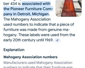 Pair of Pioneer Furniture Company mahogany demilune tables.