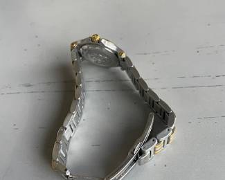 Vintage Gucci Ladie's Onyx Graphite. Date dial, Swiss Quartz, Stainless and Goldtone.