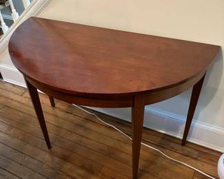 Pair of Pioneer Furniture Company mahogany demilune tables.